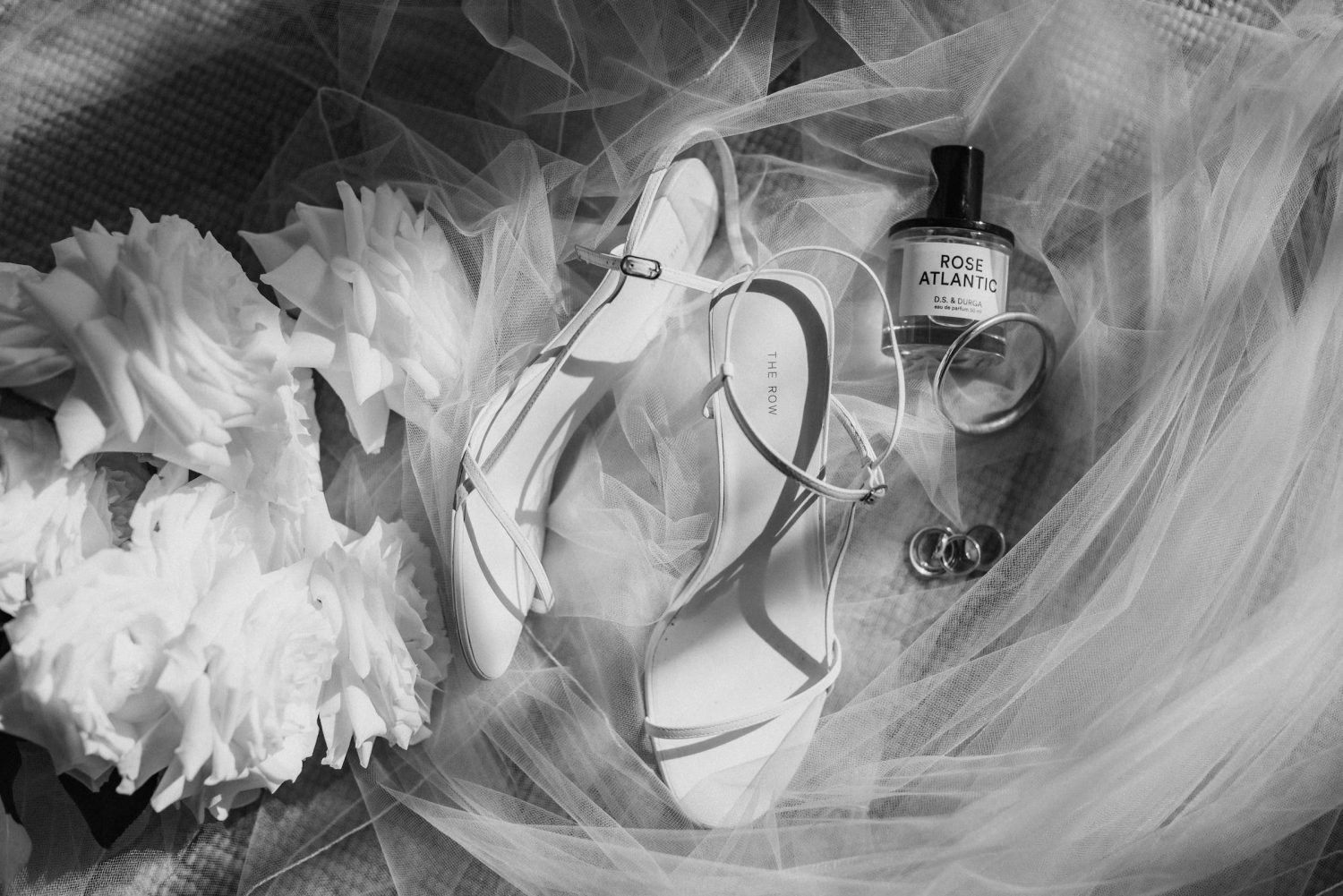 Elegant modern bridal details, The Row heels, diamond ring, perfume, veil and flowers Hawkes Bay Wedding Ana Galloway Photography