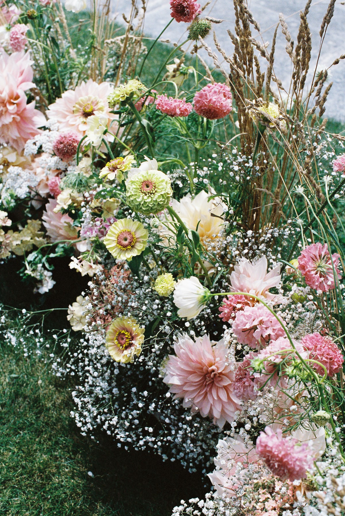 beautiful arrangement of wedding ceremony florals focusing on soft tones. Ana Galloway Photography