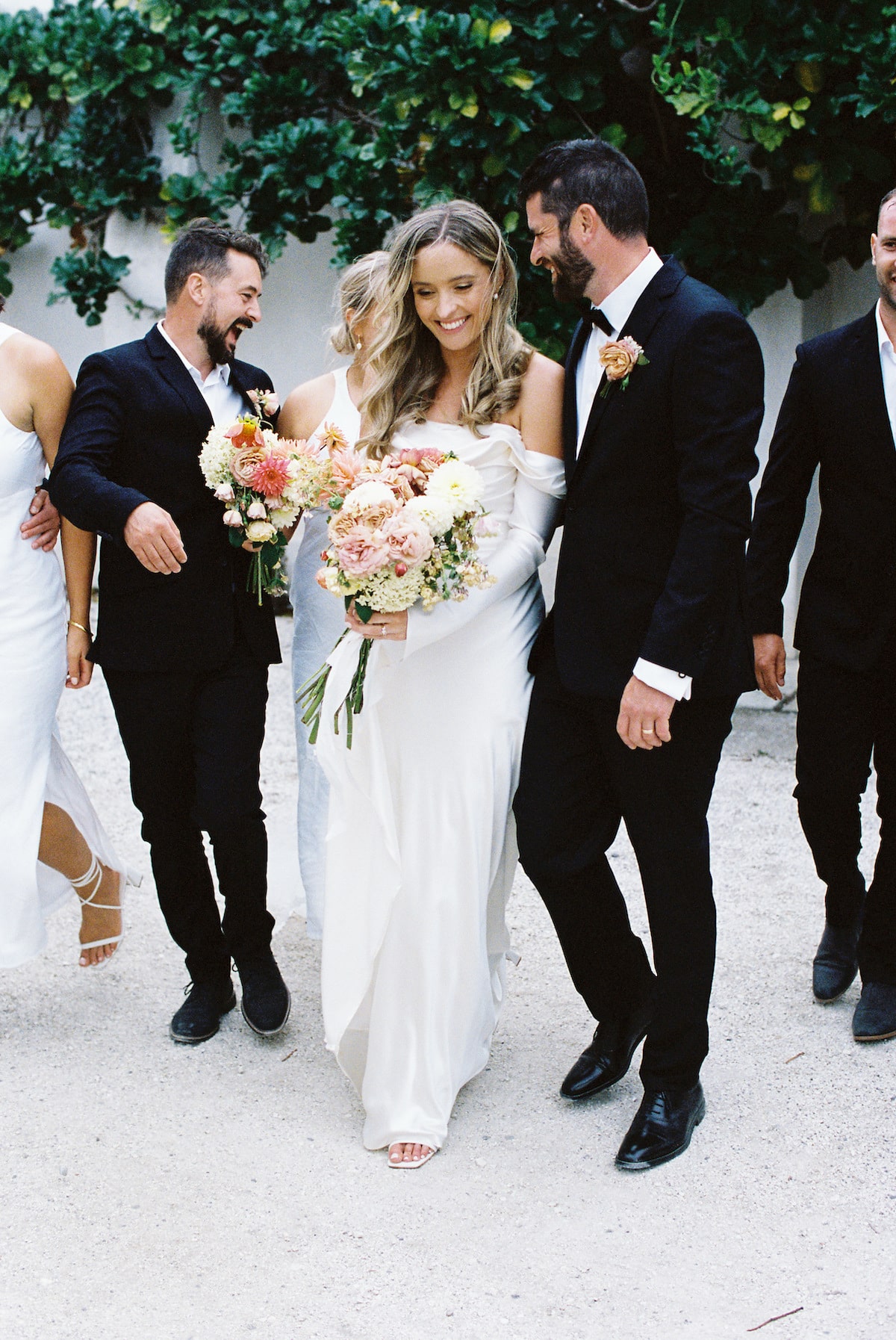 Bride and groom having fun at their bridal party with close friends and family. Ana Galloway Photography