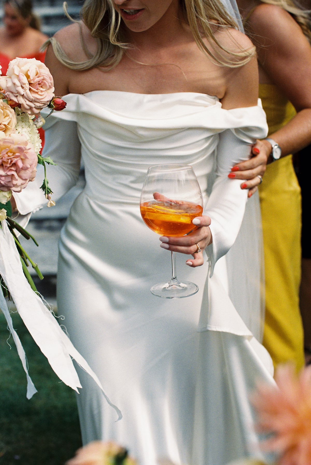 bride enjoying her bridal party in film photo. Ana Galloway Photography