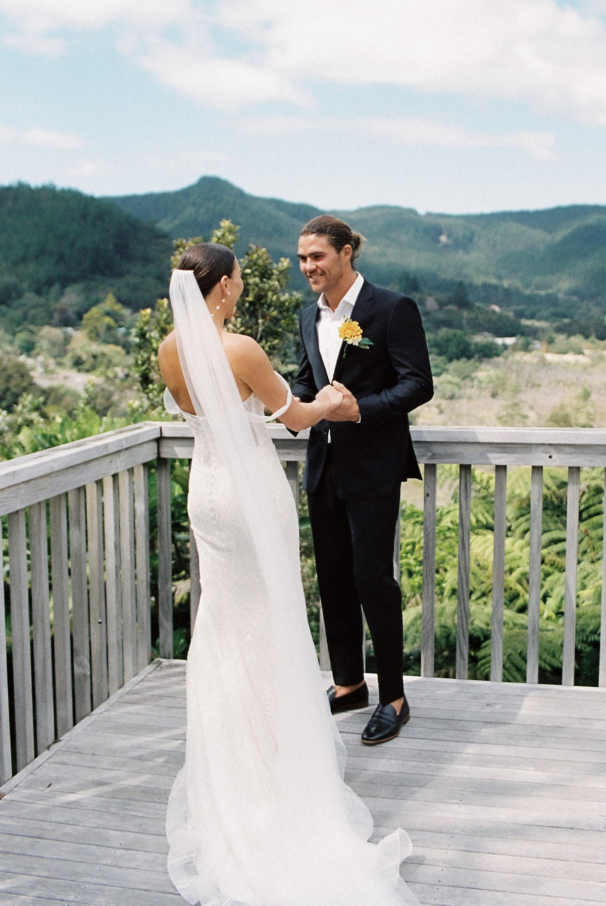 A heartwarming photo capturing the moment the couple first saw each other on their wedding day, with love and emotions on full display. Ana Galloway Photography