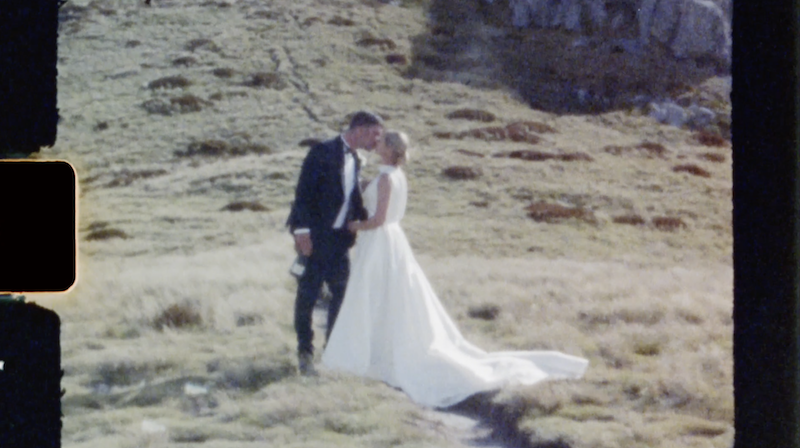 bride and groom kissing frame from super 8 film Ana Galloway Photography