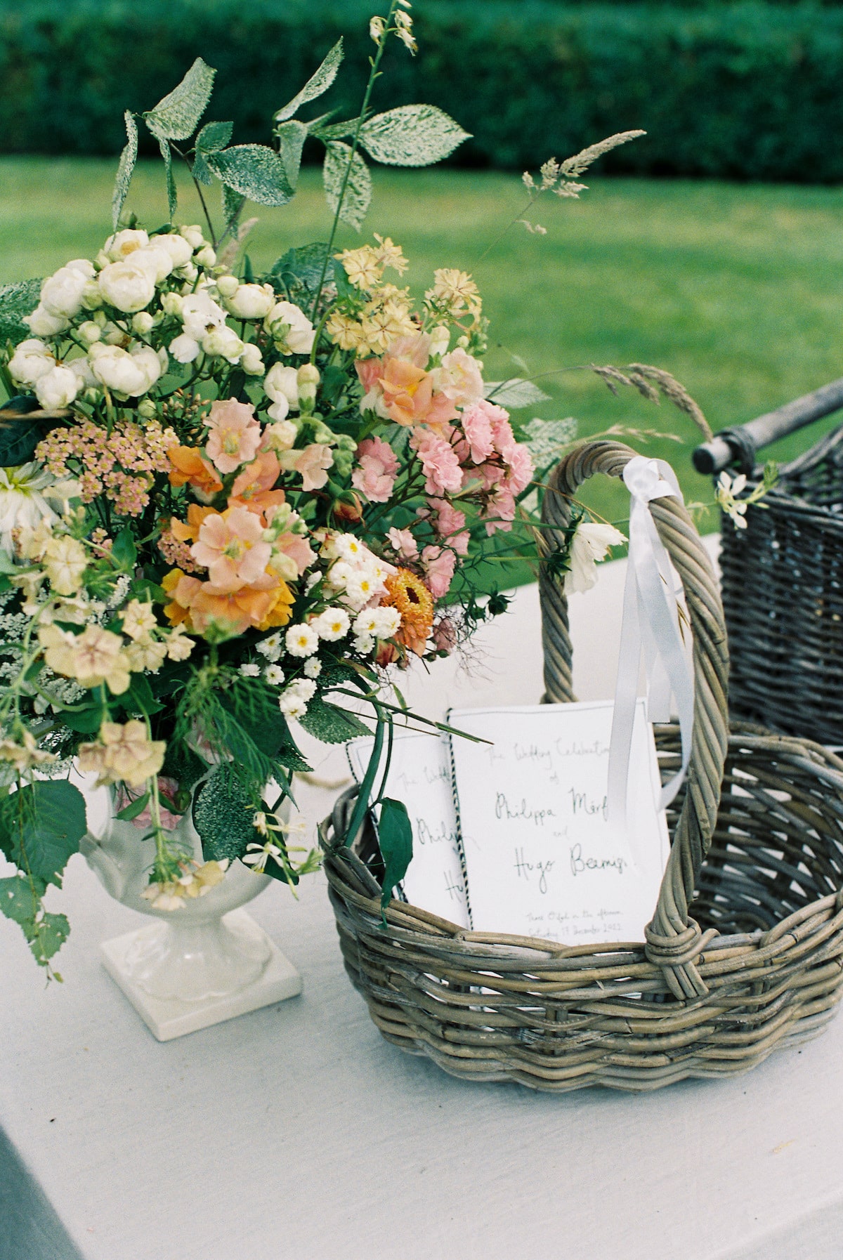 wedding ceremony detail of florals and basket film photo Ana Galloway Photography